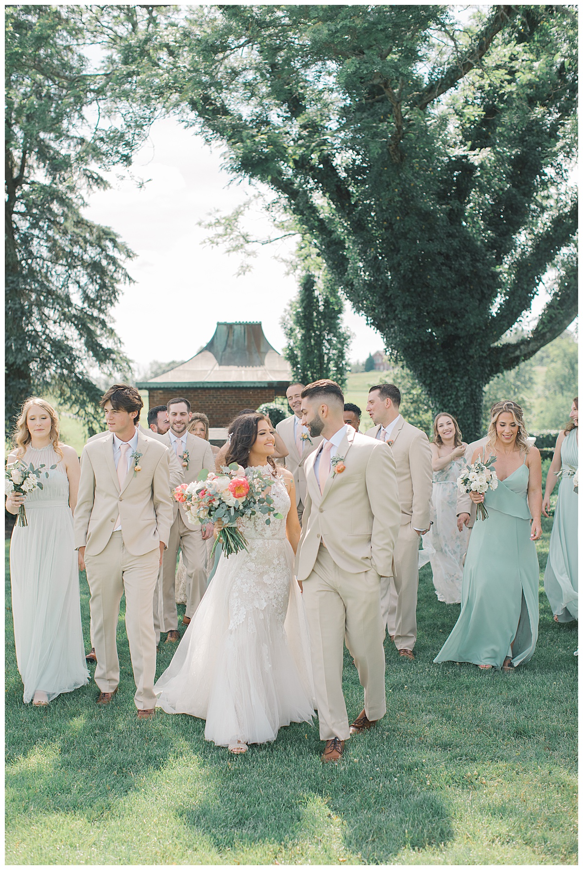 bridal party walking together at golf course 
