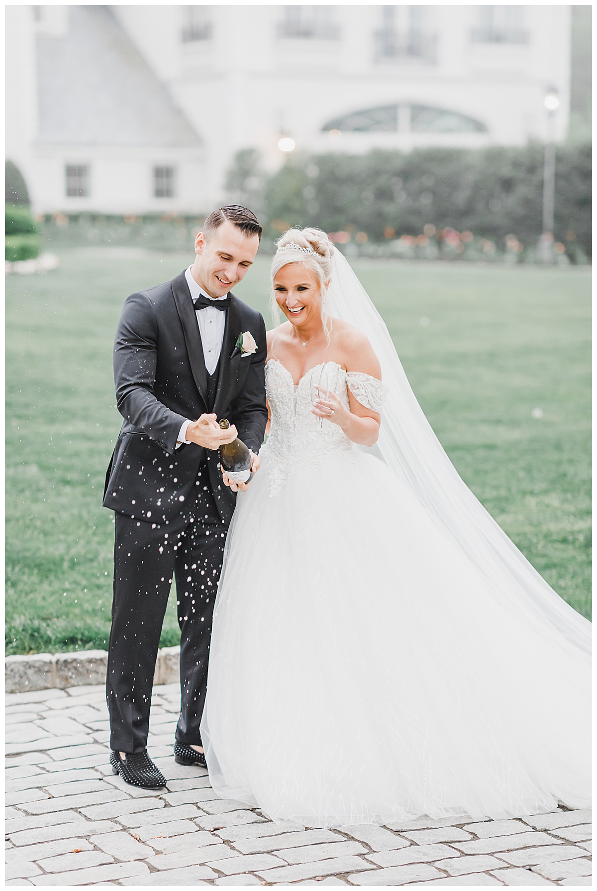 Park Chateau Estate Wedding Champagne Pop with Bride and Groom 