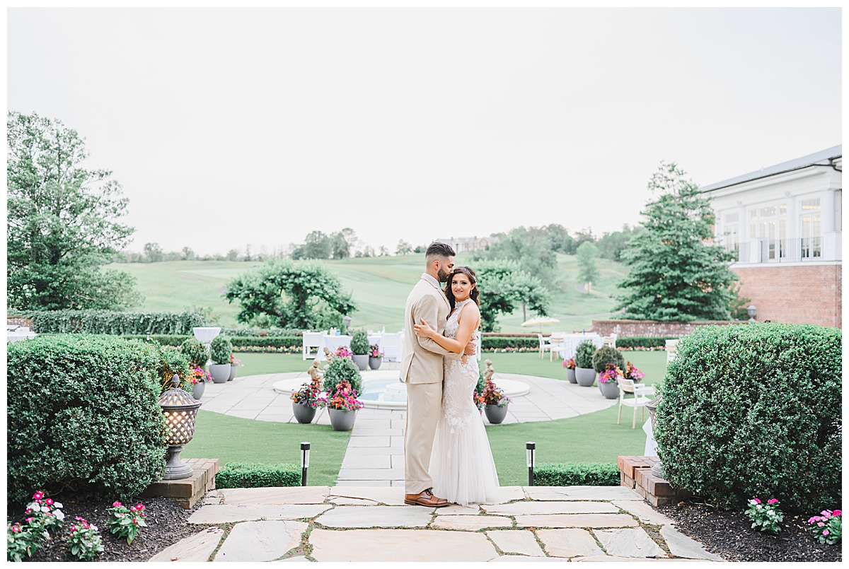 bride and groom in the gardens at Hamilton farm golf club