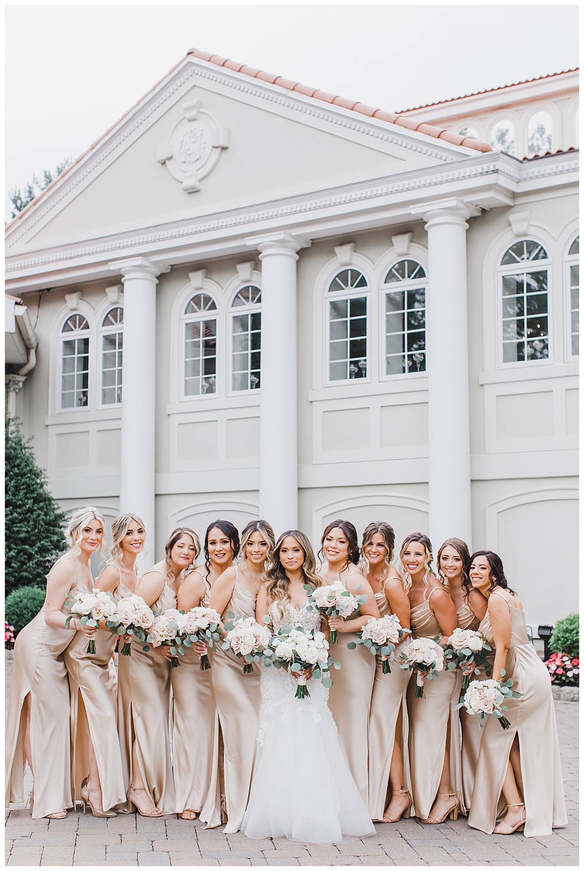bridesmaids group hug with champagne dresses 