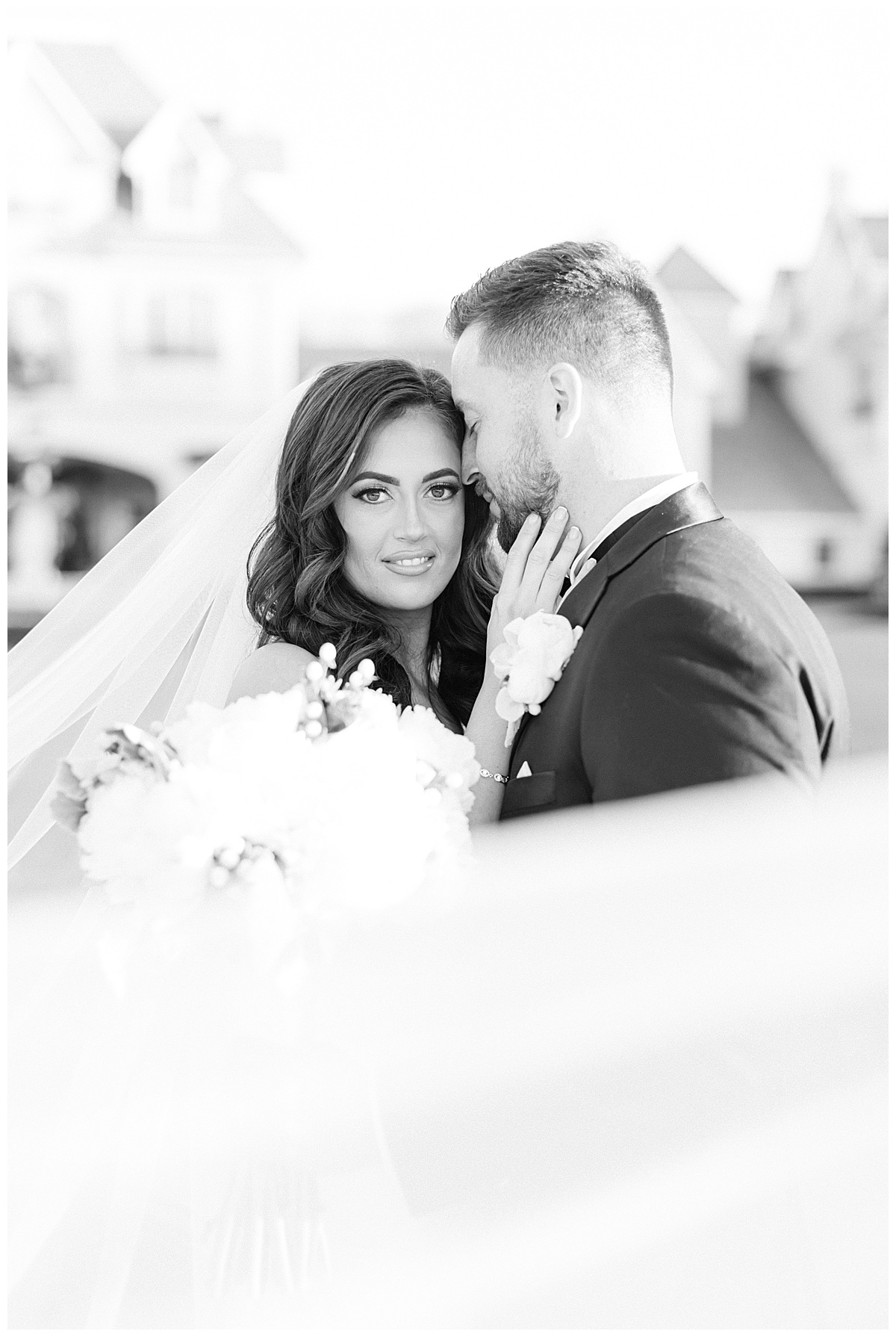 black and white image of bride and groom at park chateau 