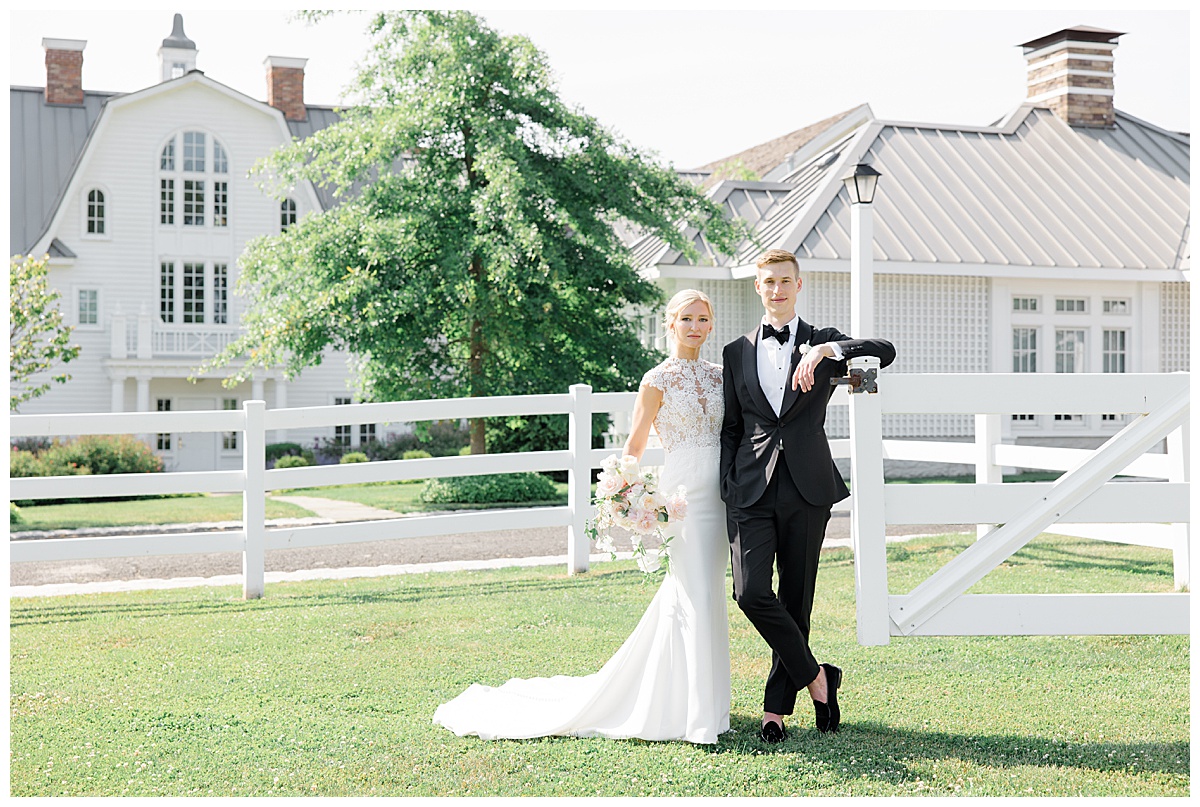 bride and groom in front of Ryland inn wedding venue 