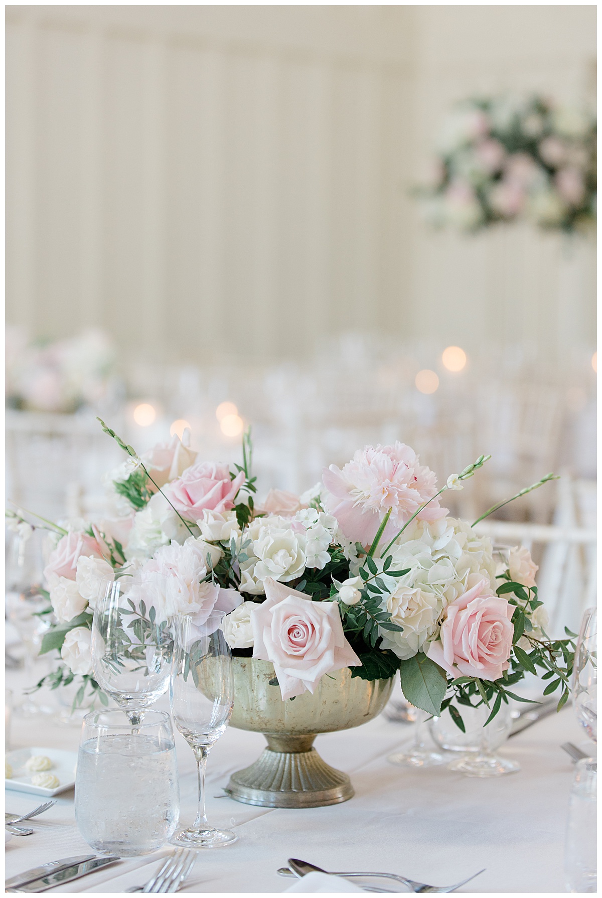 low centerpieces with roses and greenery at Ryland inn 