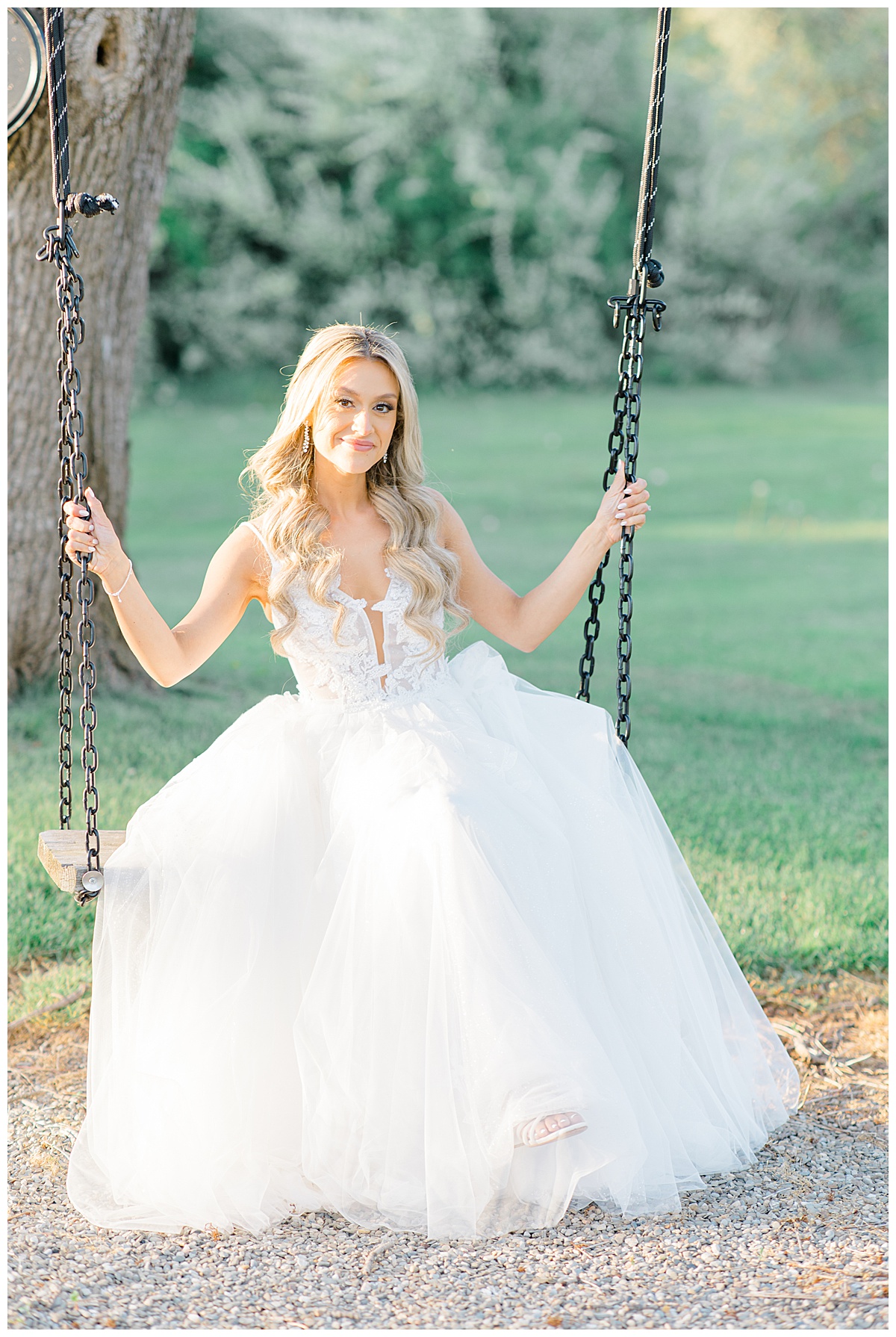 bride on the swing at the farmhouse nj