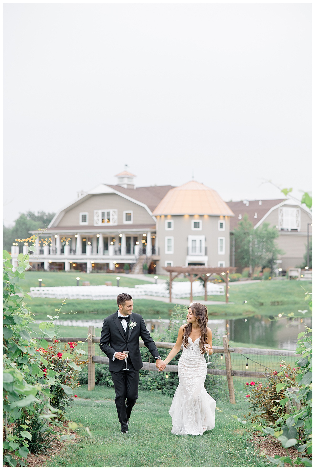 bride and groom walking in vineyard 