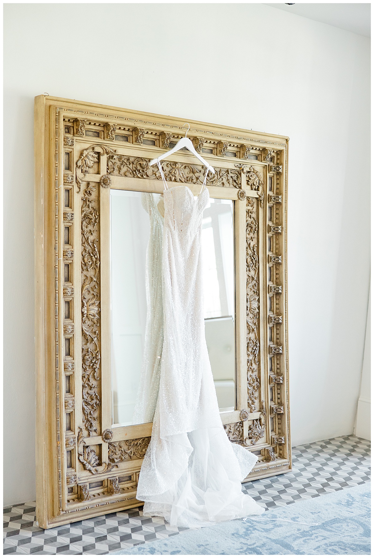 Wedding dress hanging on mirror at  Renault Winery.