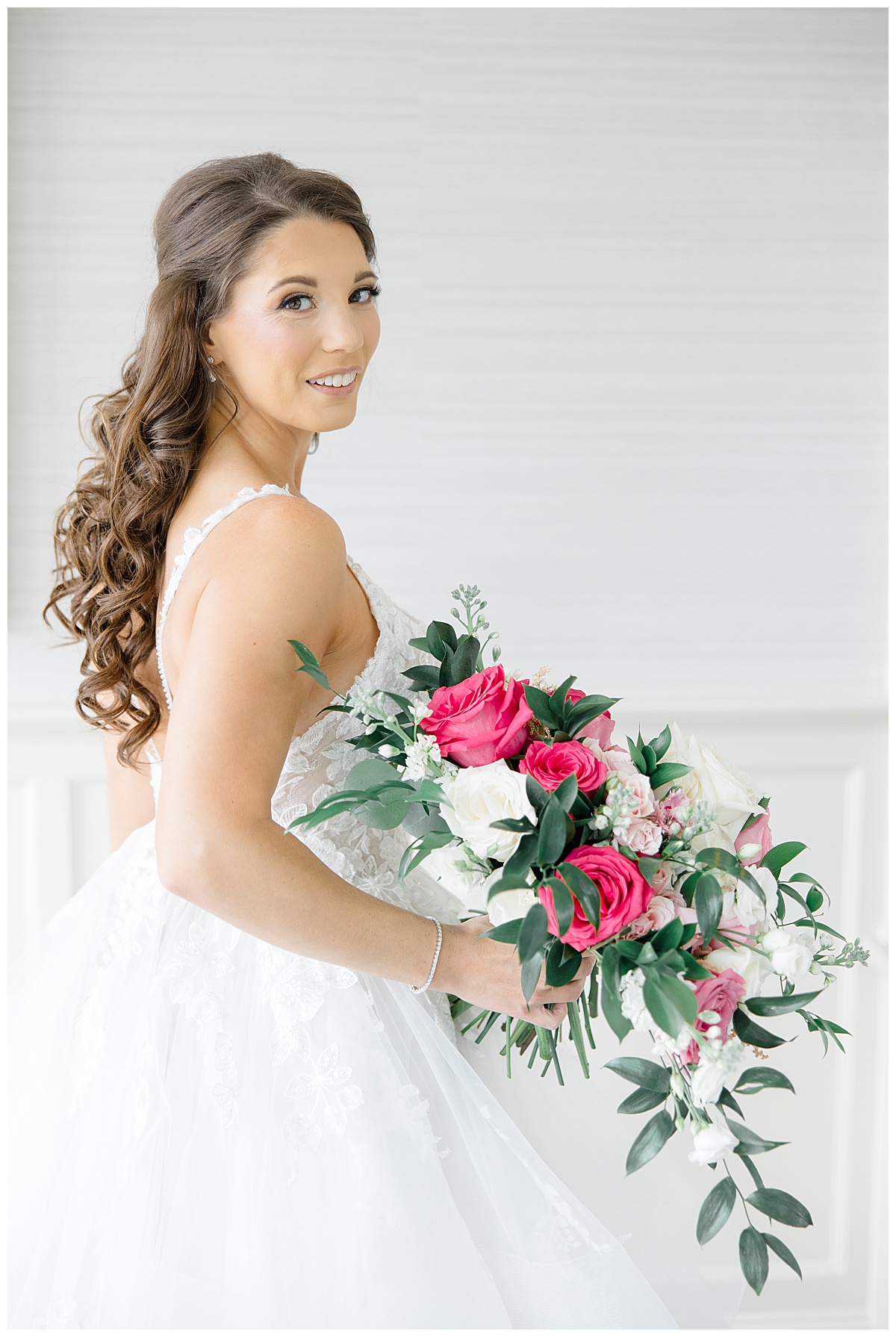 bridal portraits with bright pink bouquet 
