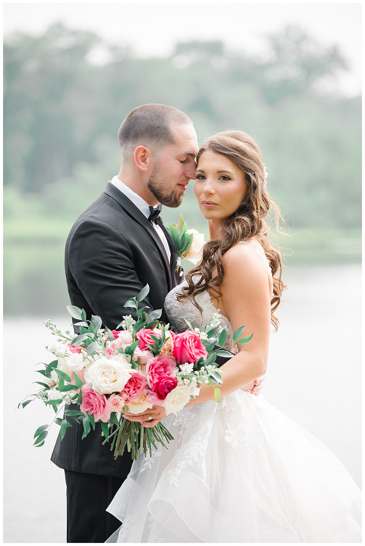 bride and groom portraits on lake 