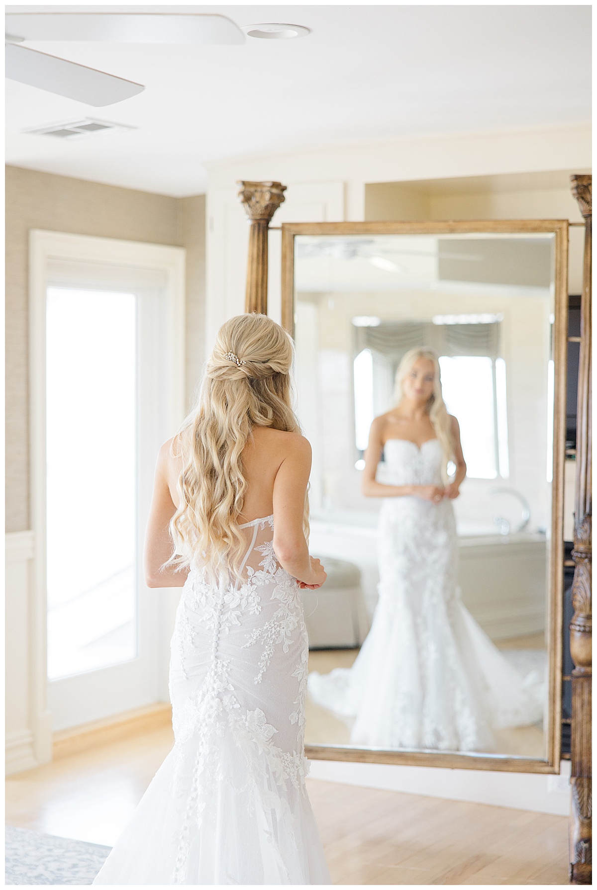 Bride looking in mirror 