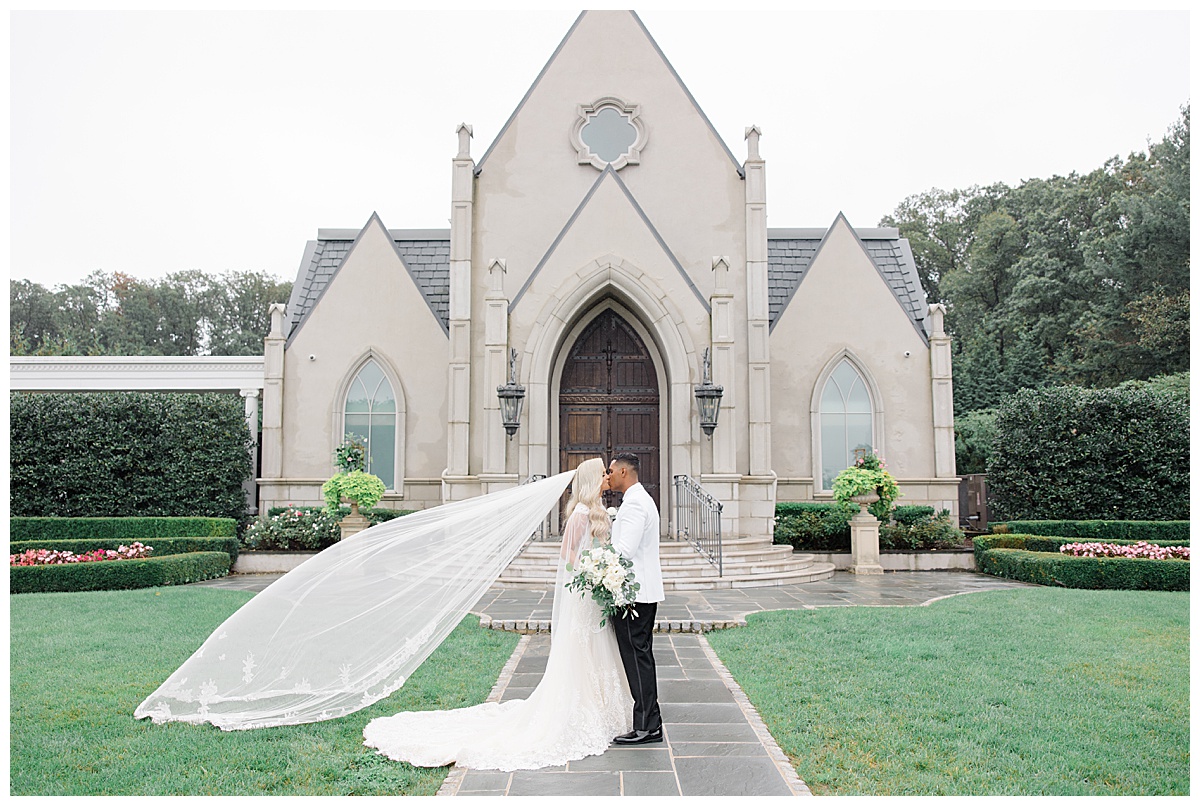 bride and groom outside chapel at park chateau 