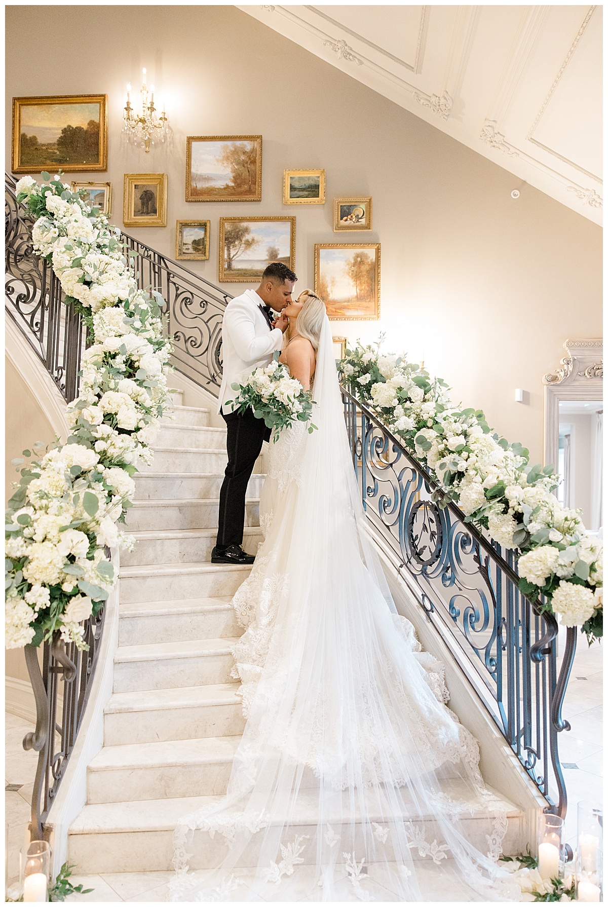 bride and groom on staircase at park chateau 