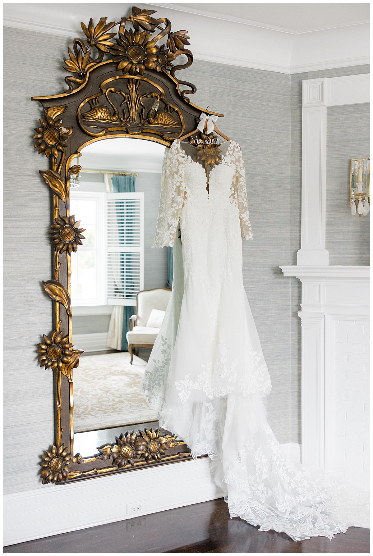 Wedding dress hanging on mirror at The Shadowbrook at Shrewsbury. 