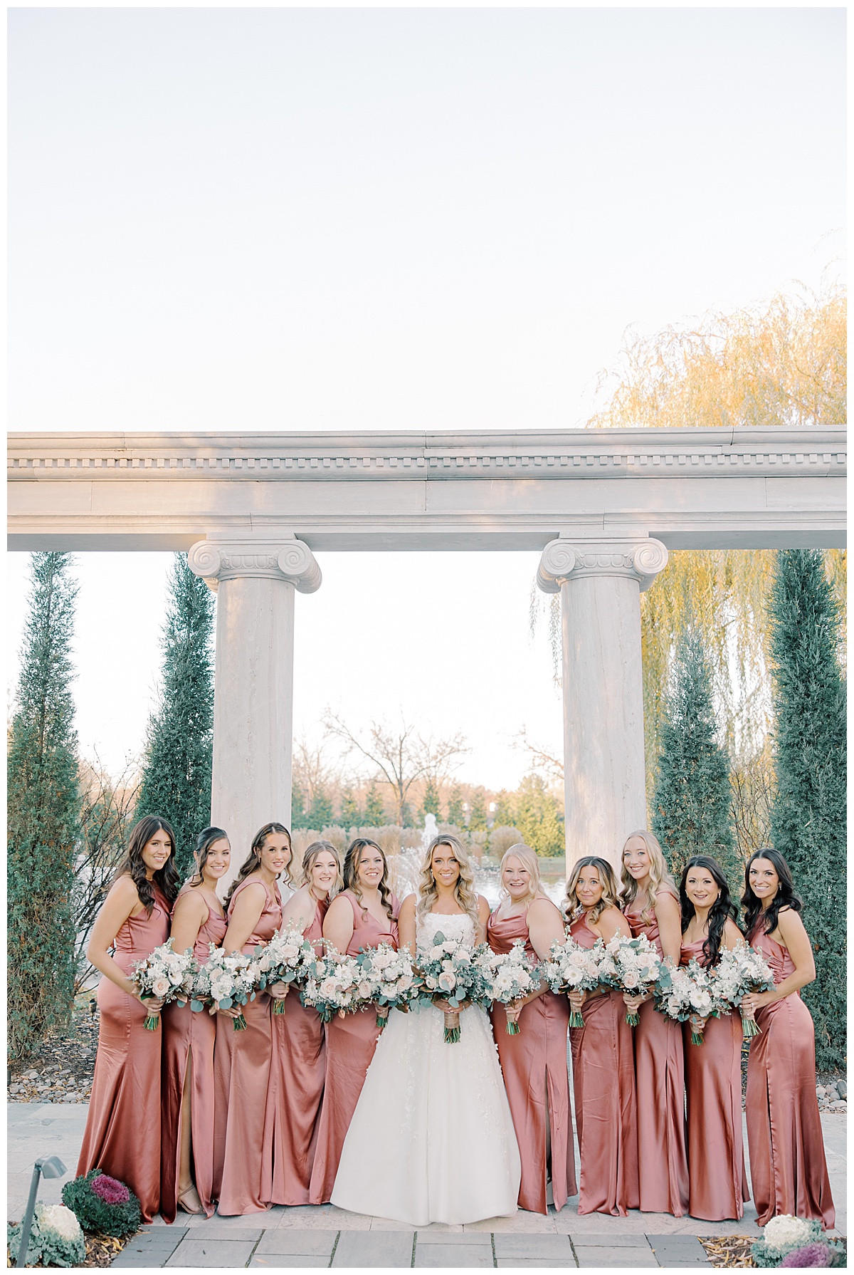 bridesmaids in pink satin dresses at the mansion on Main Street in vorhees nj 