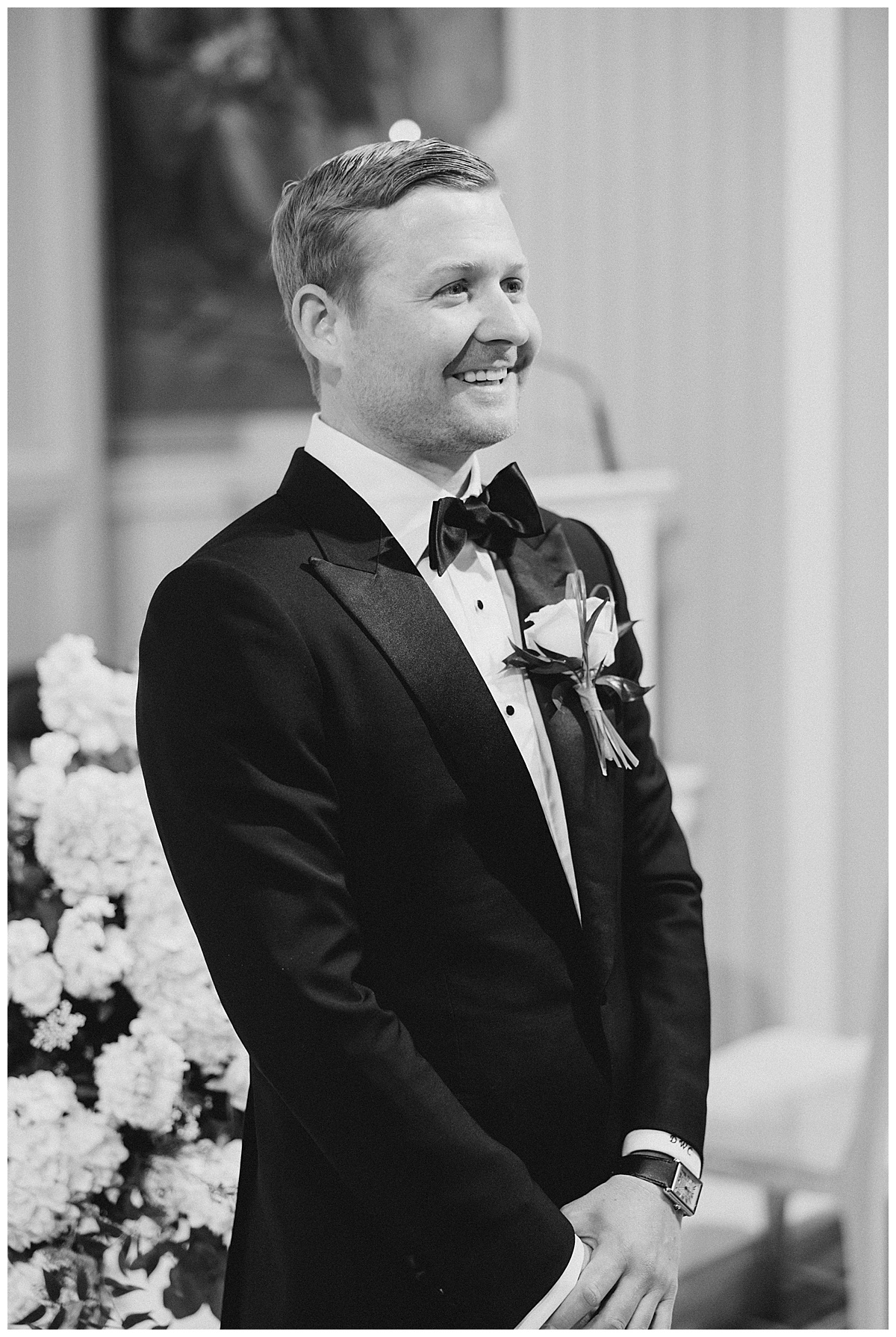 Grooms reaction to bride walking down the aisle at St. Catharine Church. 