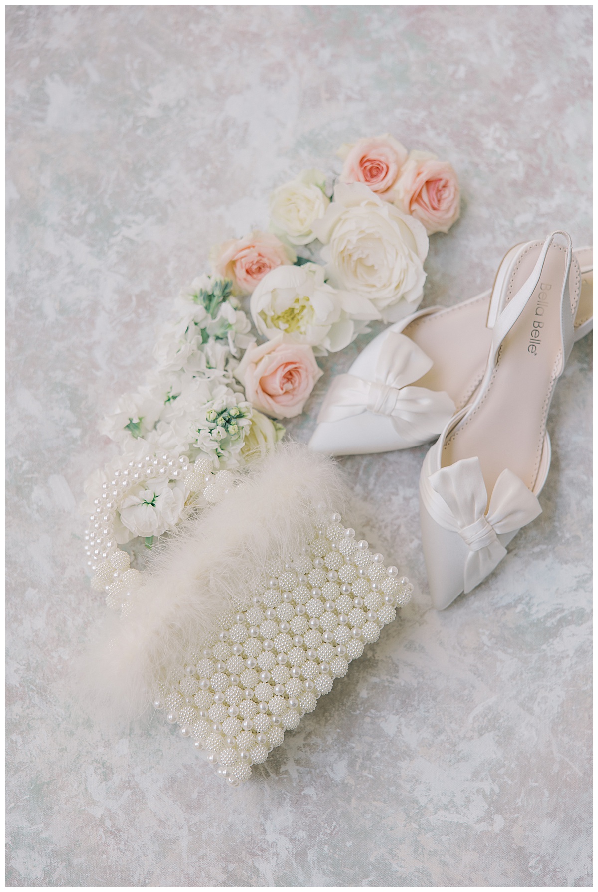 pearl and feathered purse for wedding day 