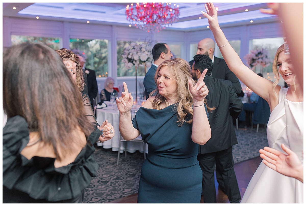 Mother of the bride dances at The Mill Lakeside Manor.  