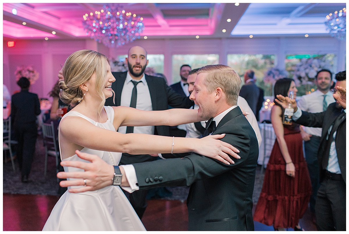 Bride and groom dance together at The Mill Lakeside Manor. 