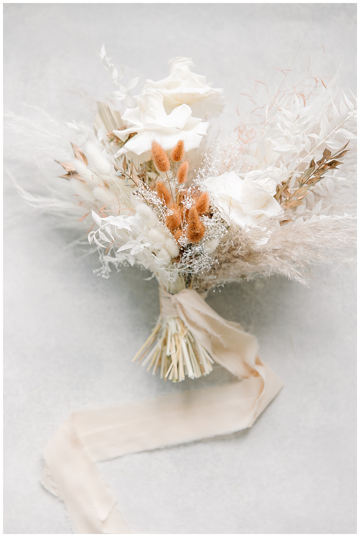 Boho wedding bouquet with dried florals. 