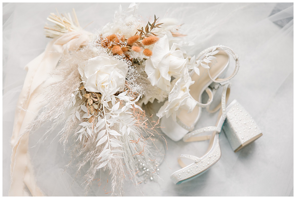 Pearl block heeled wedding shoes with boho bouquet.