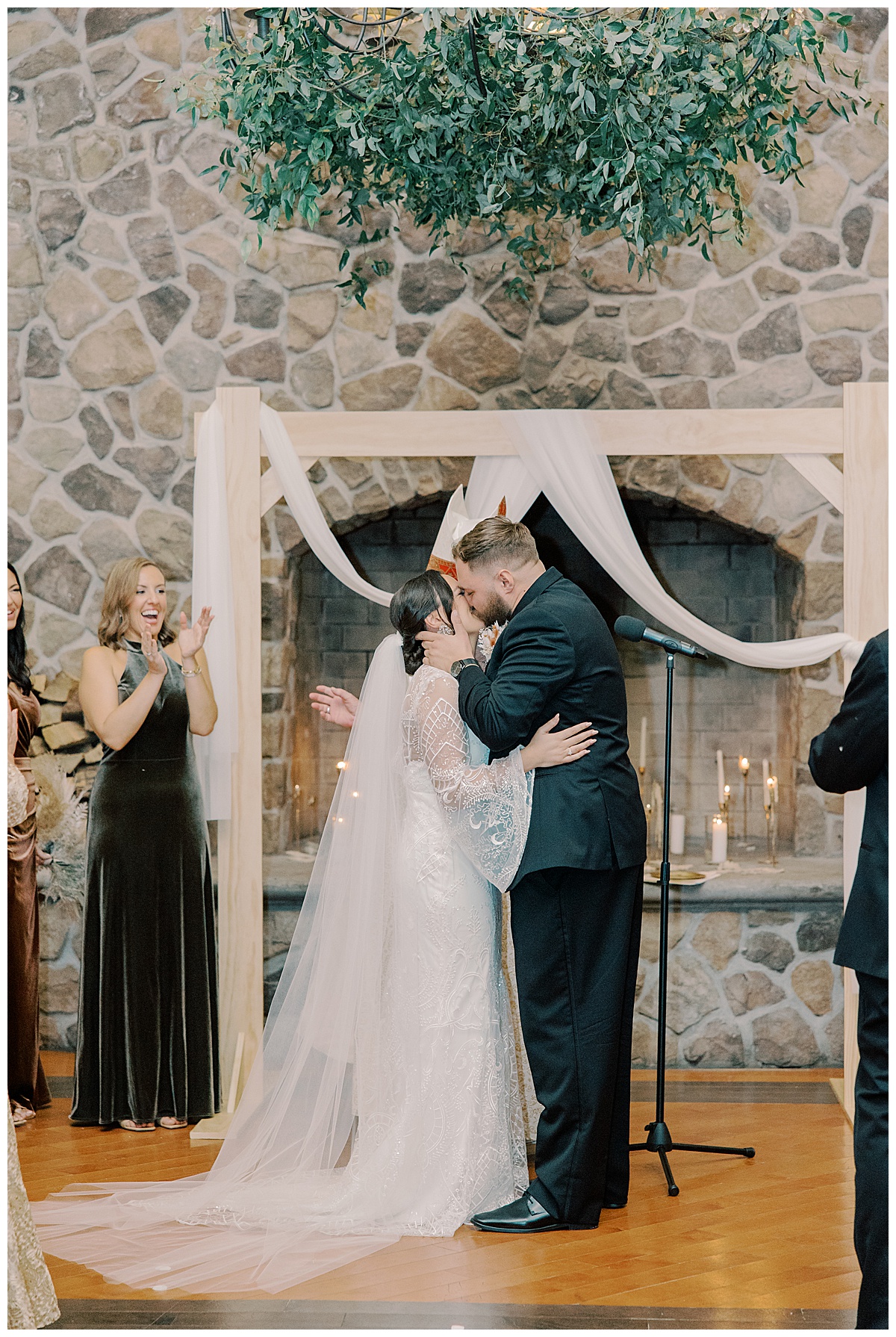 Bride and groom share their first kiss inside the Grand Ballroom at The Ryland Inn in Whitehouse Station. 