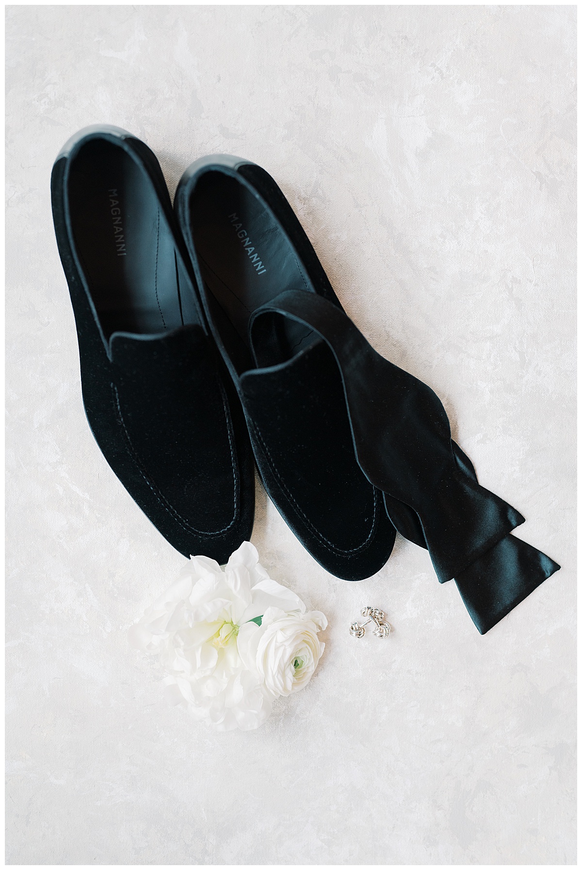 grooms details with suede loafers for wedding day and black bowtie 