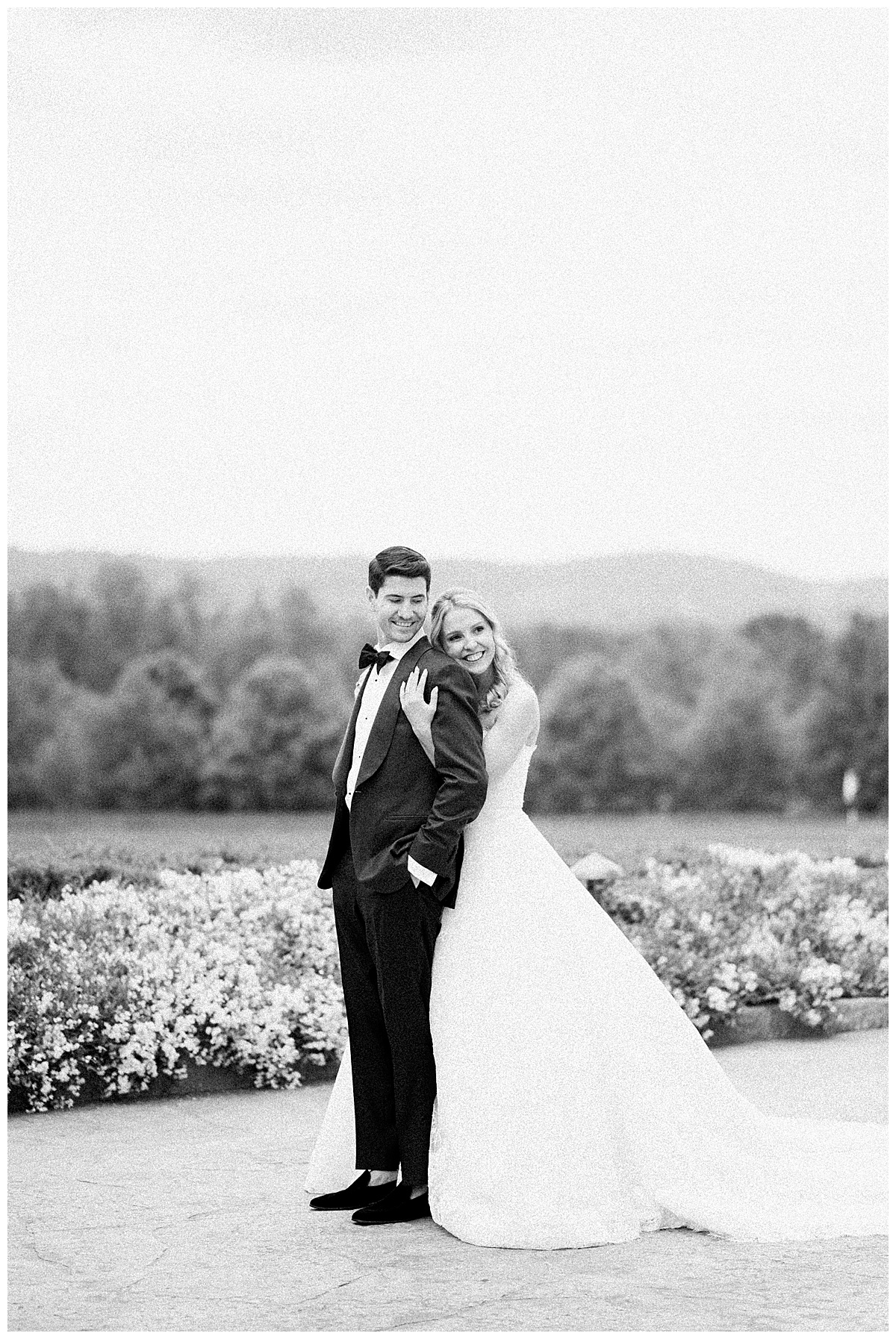 black and white image in film of bride and groom 