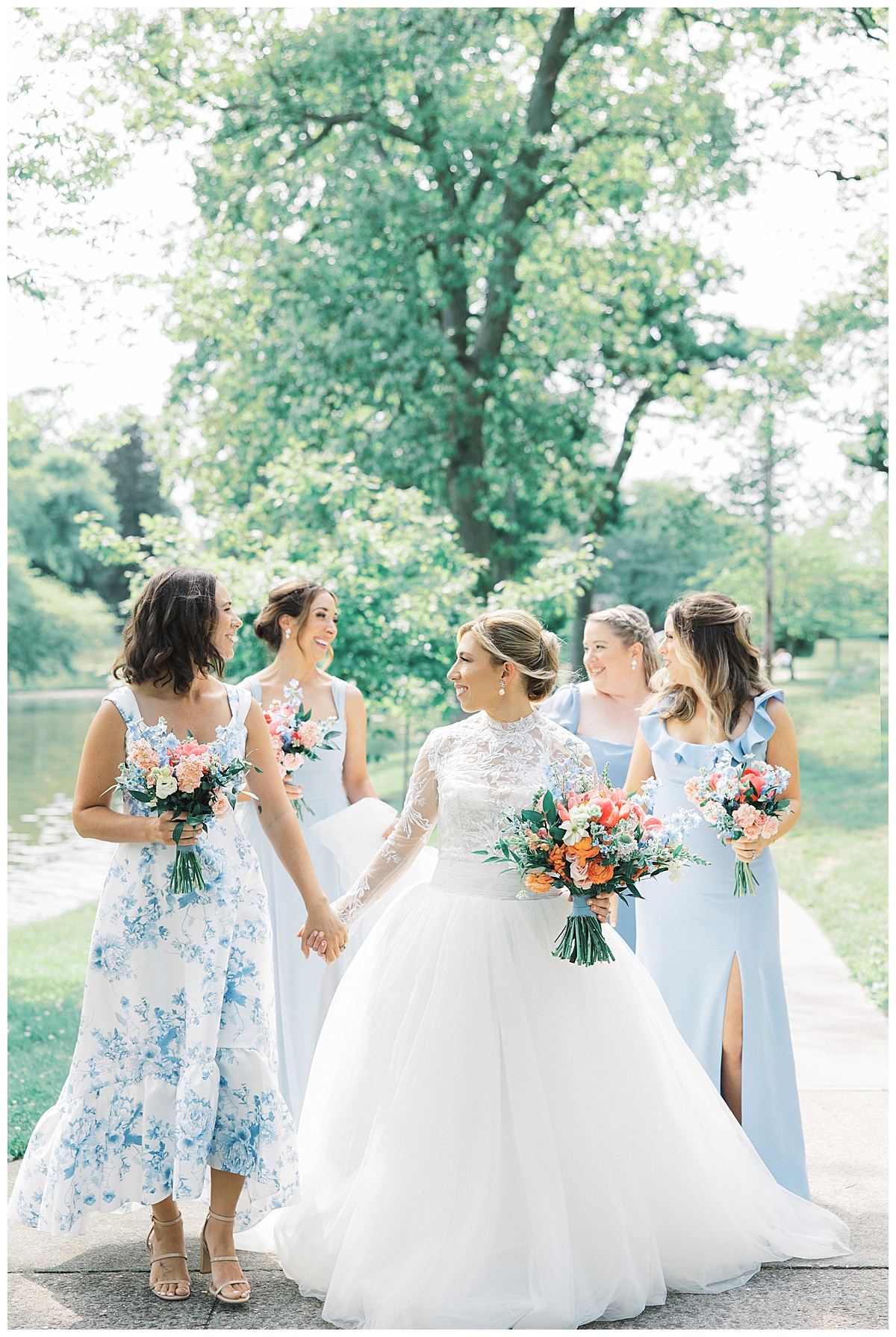 Bridesmaids in dusty blue. 