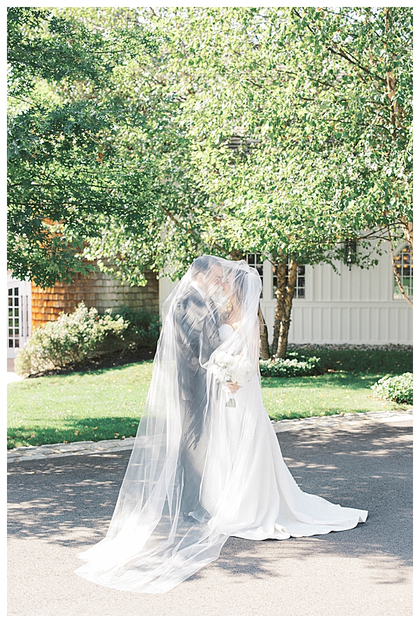 Ryland Inn NJ wedding ceremony with white florals