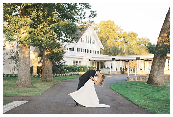 Ryland Inn NJ wedding ceremony with white florals