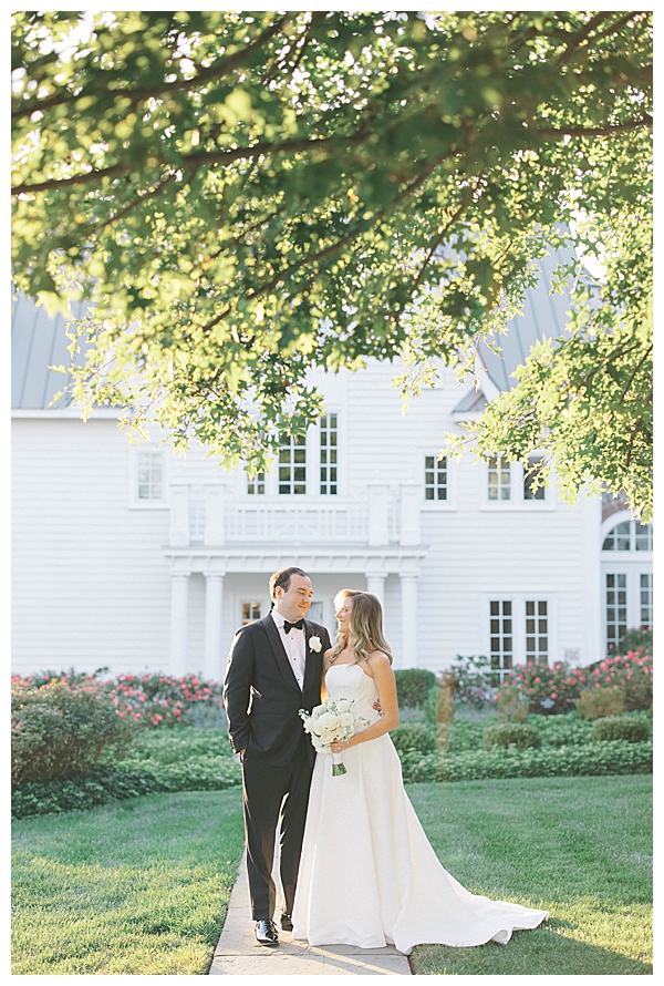 Ryland Inn NJ wedding ceremony with white florals