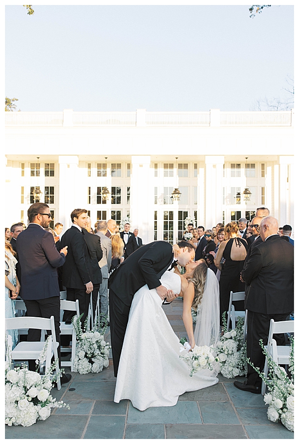 Ryland Inn NJ wedding ceremony with white florals