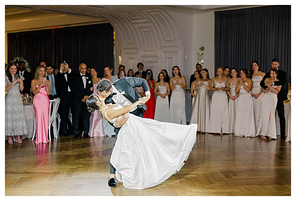 Joyful dance floor celebration during the wedding reception