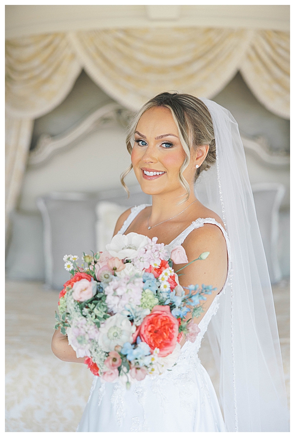 Bride hair and makeup preparation at Nantucket-inspired wedding