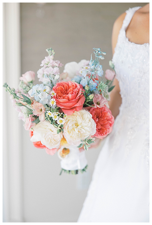 Bride in robe during wedding morning at coastal New Jersey venue