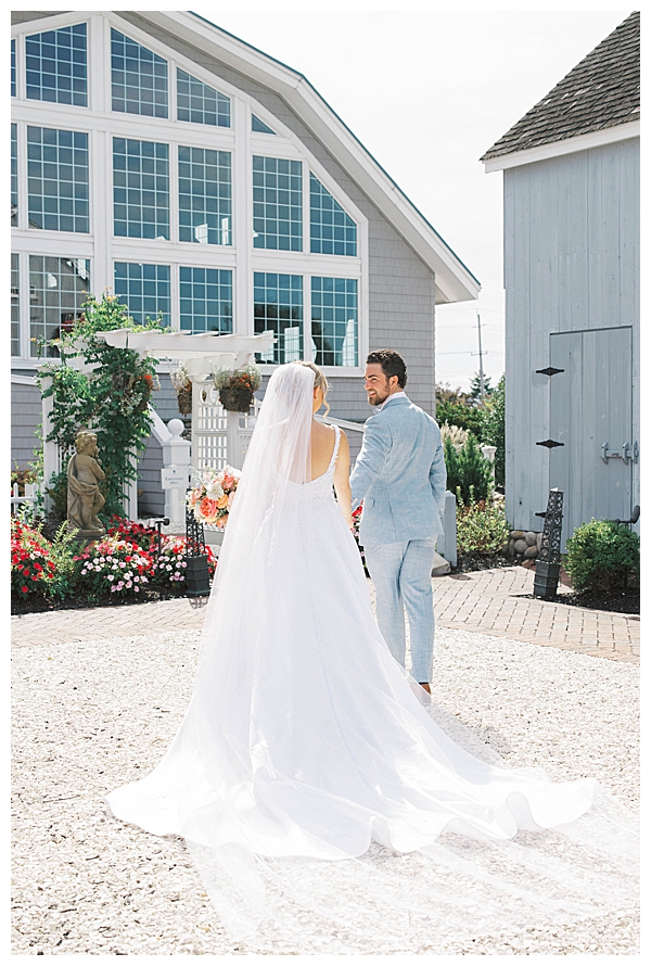 Golden hour couple portraits at seaside wedding venue