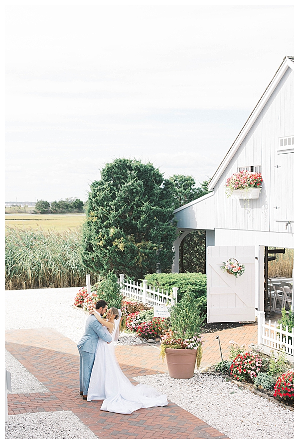 Sunset wedding portraits with waterfront views in NJ