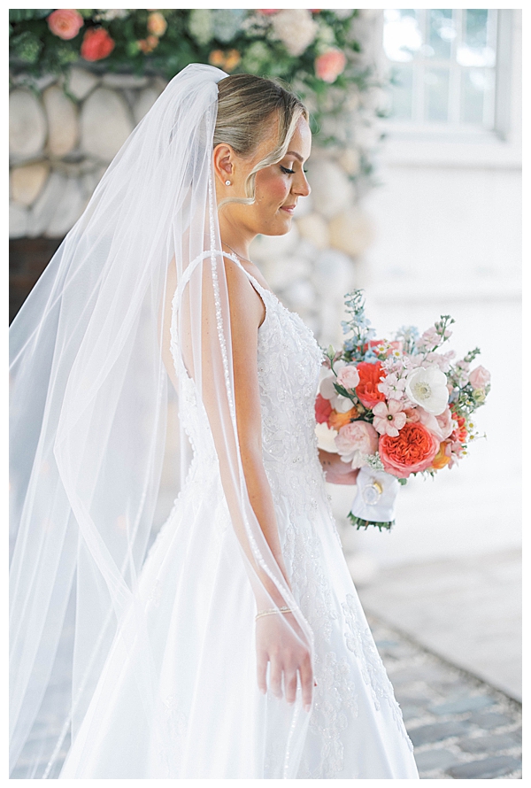 Bride and groom portraits with coastal landscape backdrop