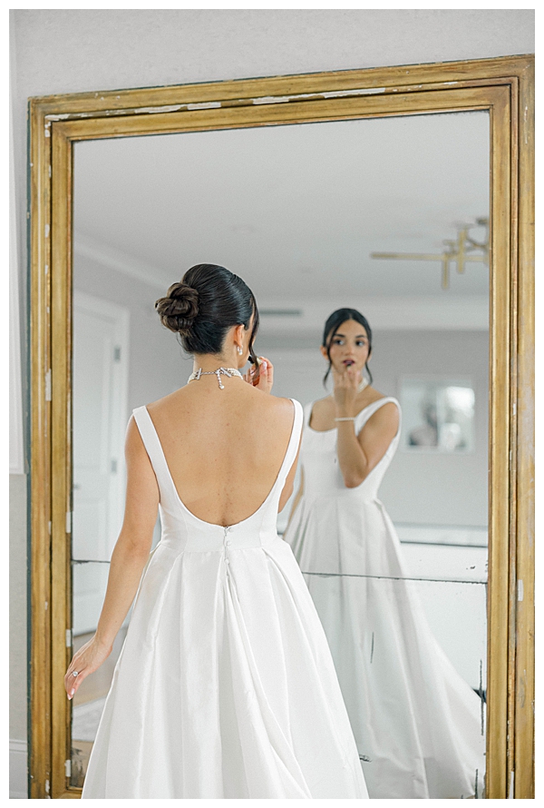 bride looking the mirror 