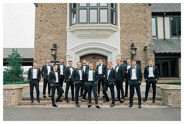 Large bridal party group portrait at the black tie wedding in Eatontown NJ