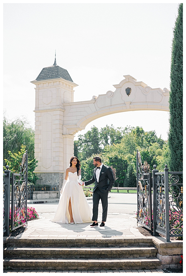groom walking bride down the stairs