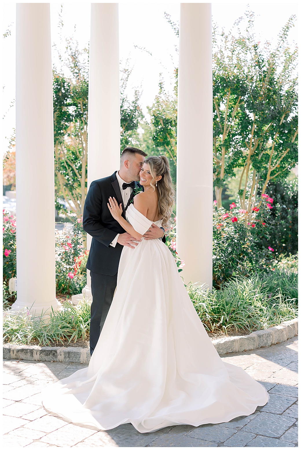 Dreamy outdoor couple portrait with golden hour lens flare at a New Jersey wedding