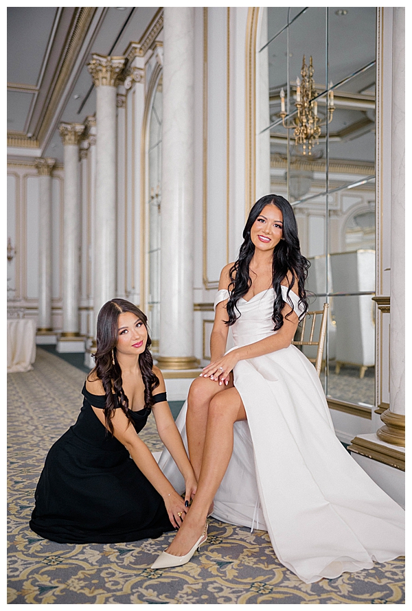 maid of honor helping with shoes