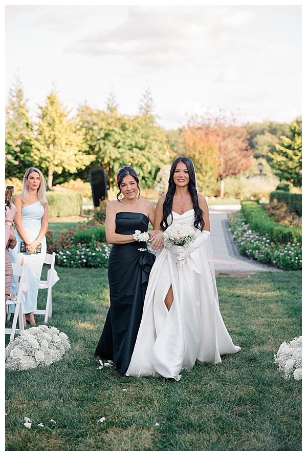 mom walking bride down the aisle