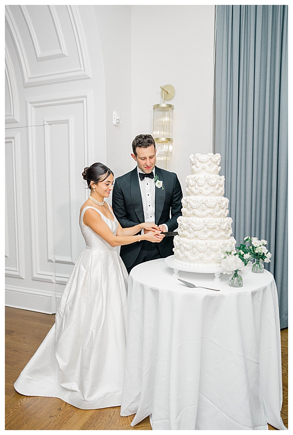 Bride and groom cake cutting