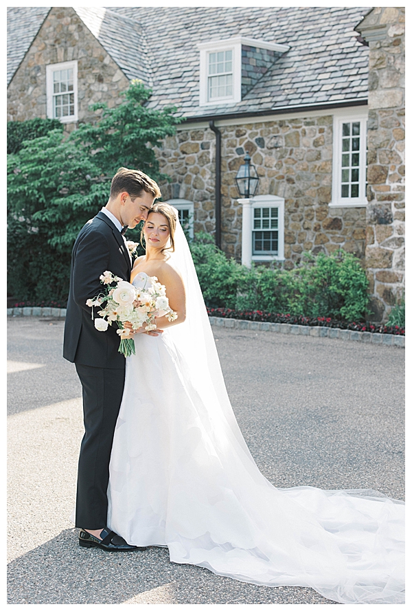 Couple sharing intimate moment in Fiddler’s Elbow gardens