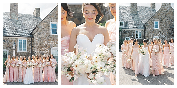 Bridesmaids posing with blush and white floral bouquets