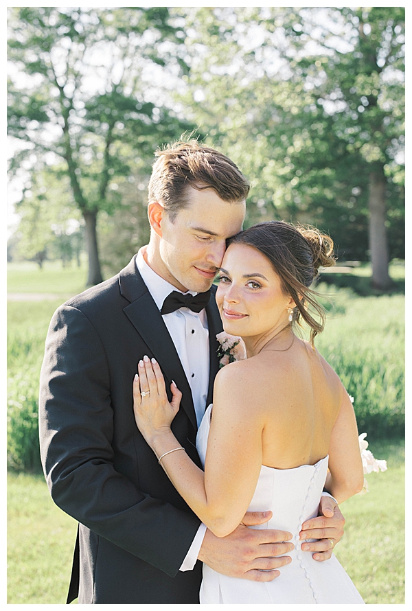 Golden-hour portrait of bride and groom at Fiddler’s Elbow