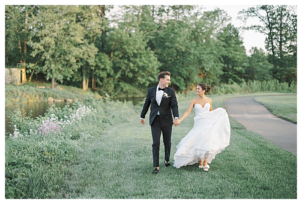 Bride and groom laughing together at Fiddler’s Elbow