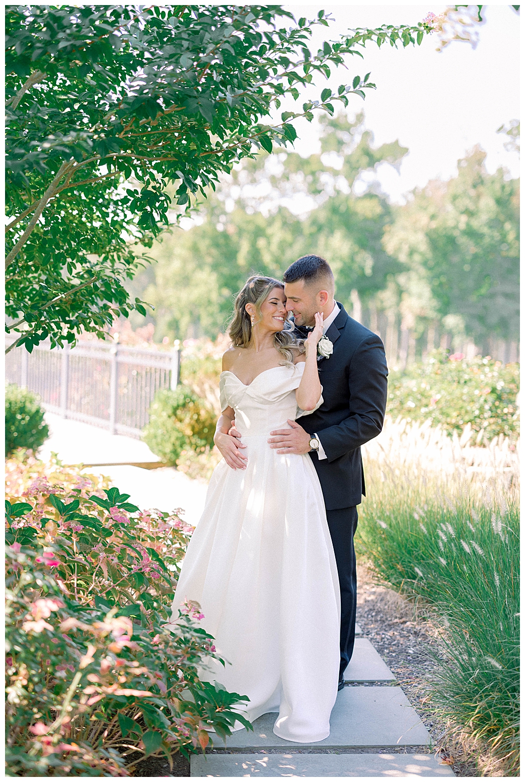 Groom dipping his bride during a playful and joyful couple portrait at their New Jersey wedding