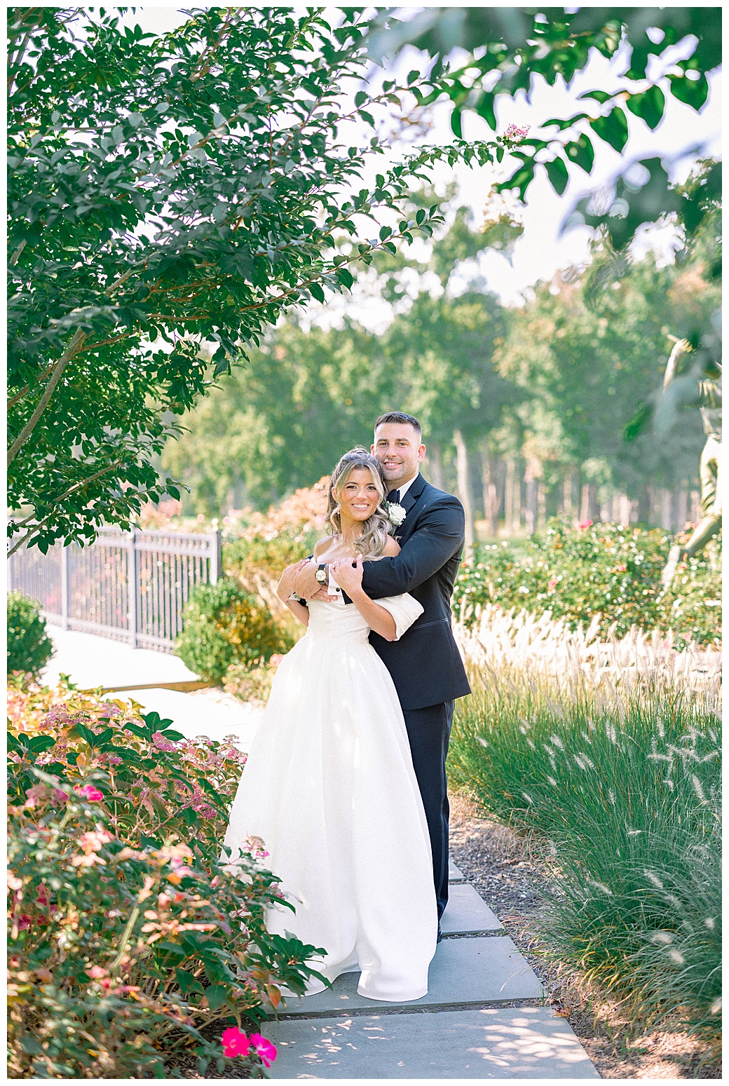 Romantic bride and groom portraits during golden hour at their New Jersey wedding, bathed in warm evening light